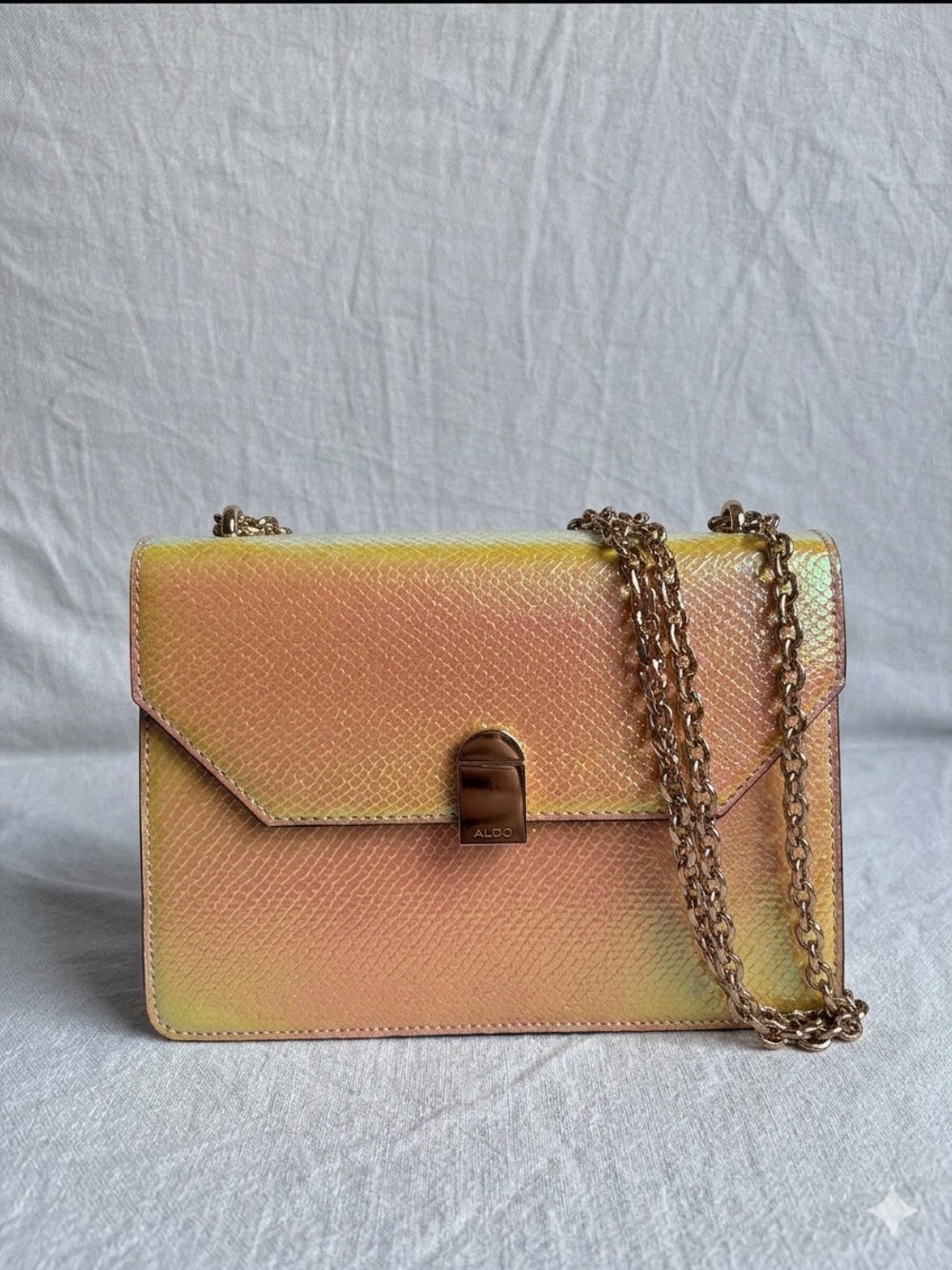 ALDO Iridescent Peach-Pink Crossbody with Gold Chain